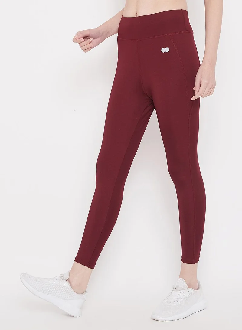 Clovia Red High Rise Activewear Tights in Maroon for Women | Best Price UAE